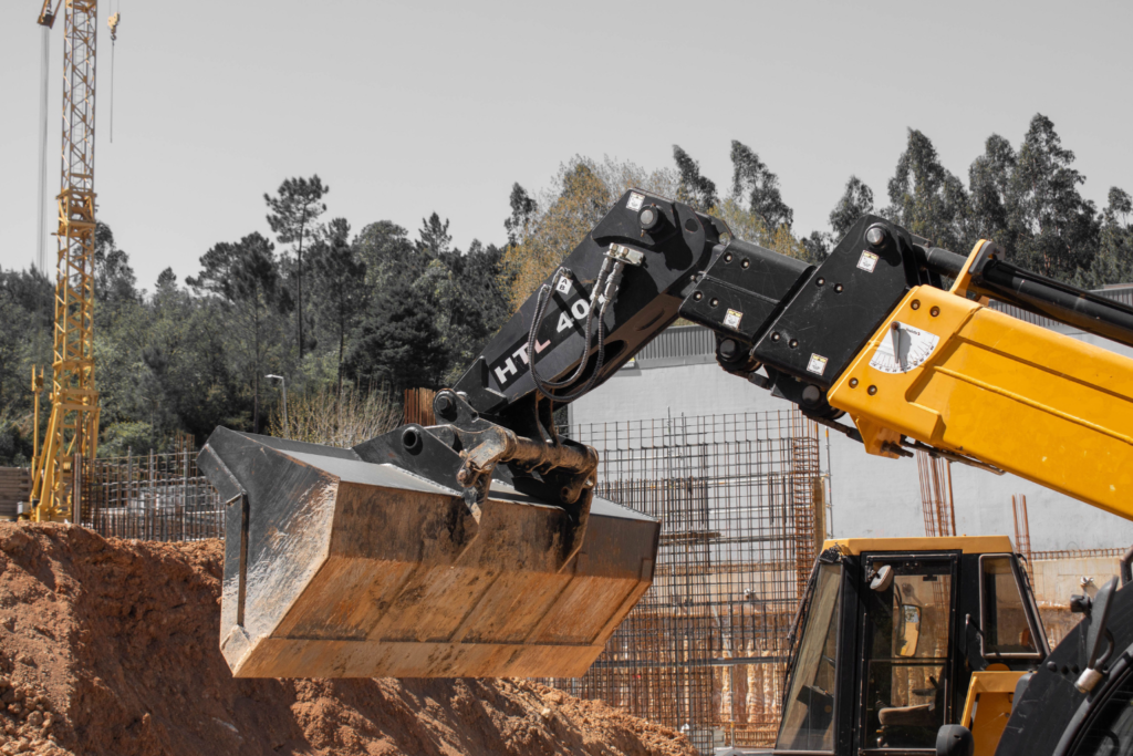 Excavator picking up dirt