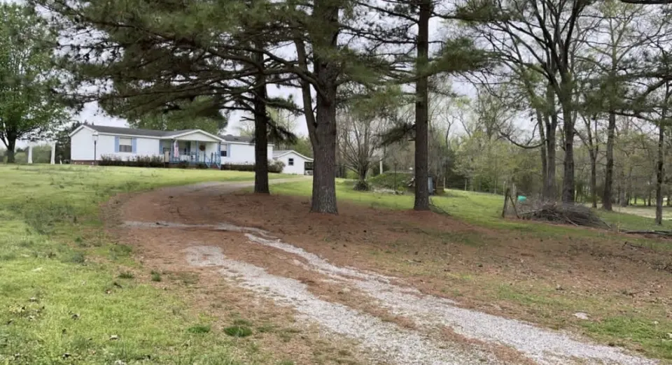 Before — driveway regrading and repair