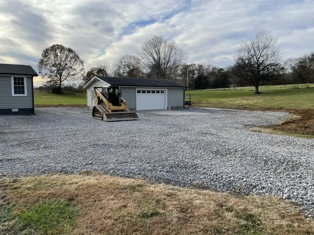 Gravel driveway and garage access