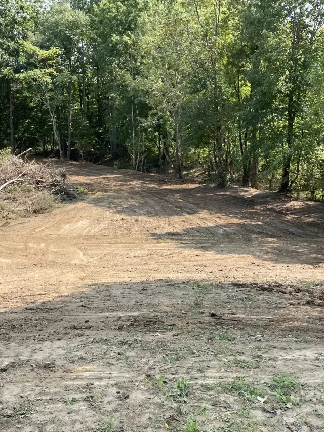 Storm cleanup and regrading after flooding